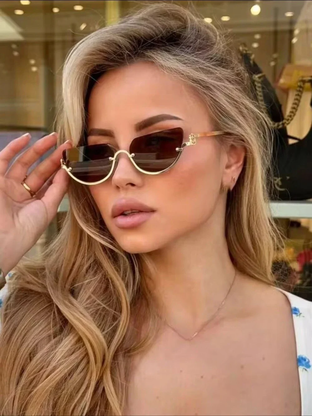 Gold Frame Sunglasses with Brown Lenses - Sleek Cat-Eye Style
